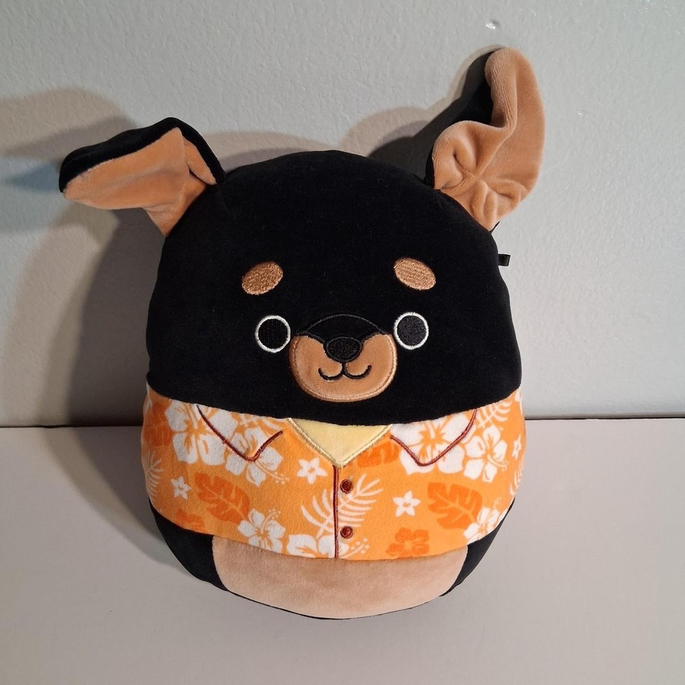 Black Rottweiler Squishmallow with orange floral shirt no hang tag